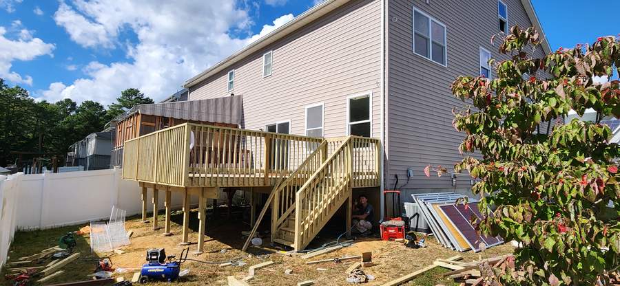 Deck build against fresh siding