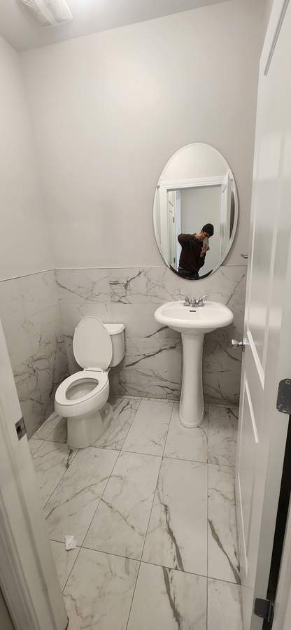 Marble bathroom with pedestal sink