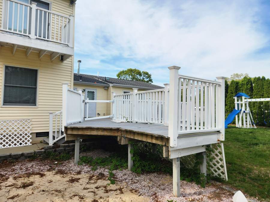 New rear deck with white railings